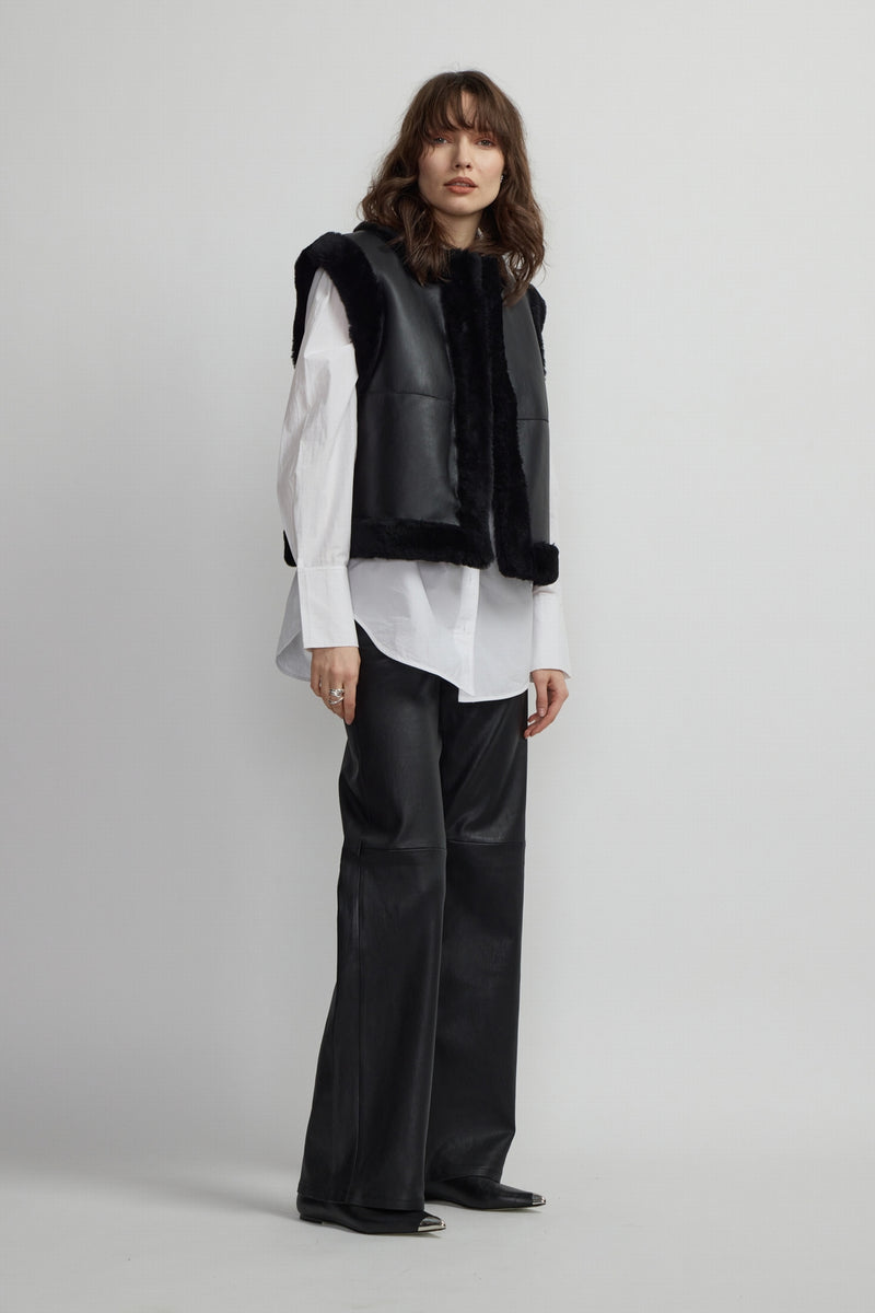 VESTE RACCOURCIE SANS MANCHE
