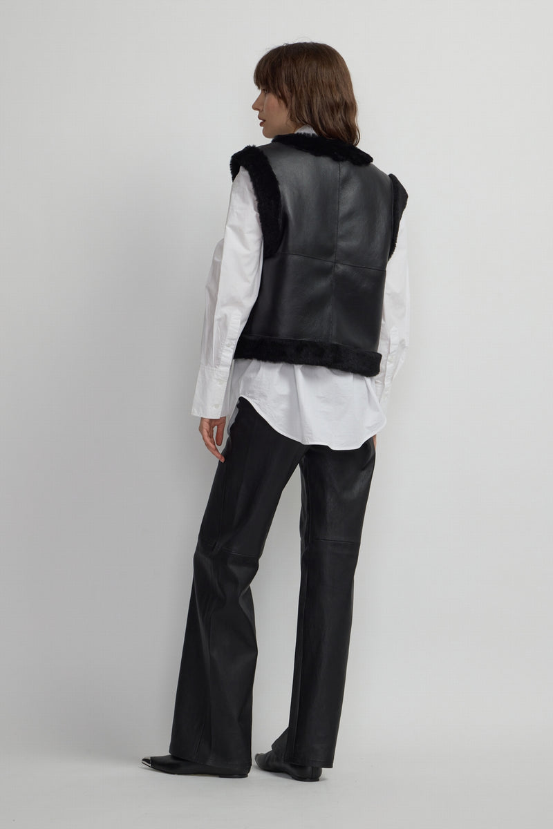 VESTE RACCOURCIE SANS MANCHE